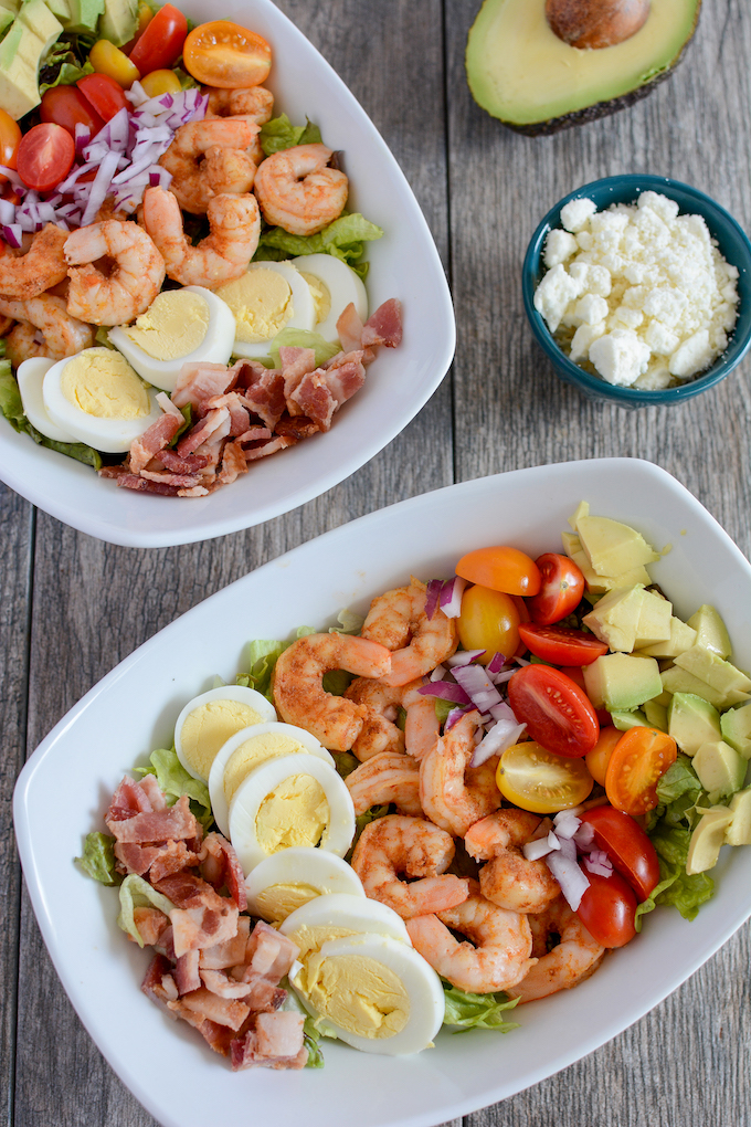 Shrimp Cobb Salad 2 shrimp cobb salad with bacon, avocado, egg, tomato and onion