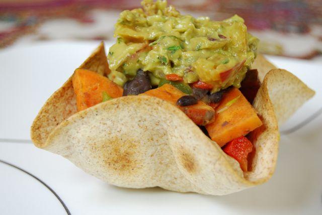 Did you know it's super easy to make tortilla bowls at home? Use whole wheat tortilla shells and bake them in the oven for a healthy, edible taco bowl!