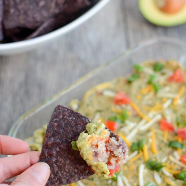 Packed with protein, this recipe for Hot Mexican Layer Dip is an easy, healthy appetizer that's perfect for parties, game days and other gatherings.