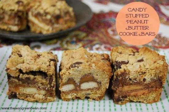 Candy and cookies collide for the ultimate dessert in these Candy Stuffed Peanut Butter Cookies Bars