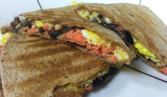 Change up your breakfast routine and try this breakfast quesadilla packed with salmon, black beans and eggs!