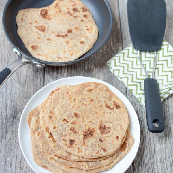 Made with just 4 ingredients, this recipe for Homemade Whole Wheat Tortillas is easy to make and tastes way better than store-bought!
