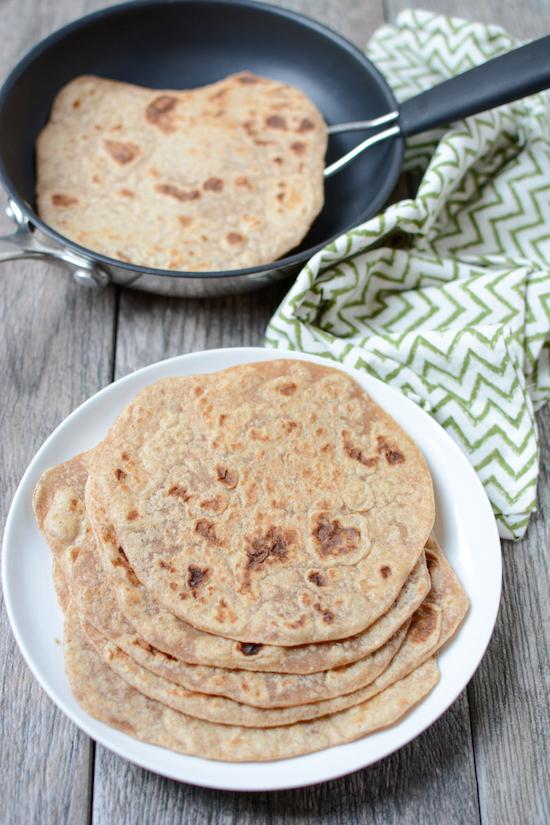 These Homemade Whole Wheat Tortillas are made with just 4 ingredients. They're so easy to make and taste way better than store-bought! Perfect for healthy lunches and dinners.