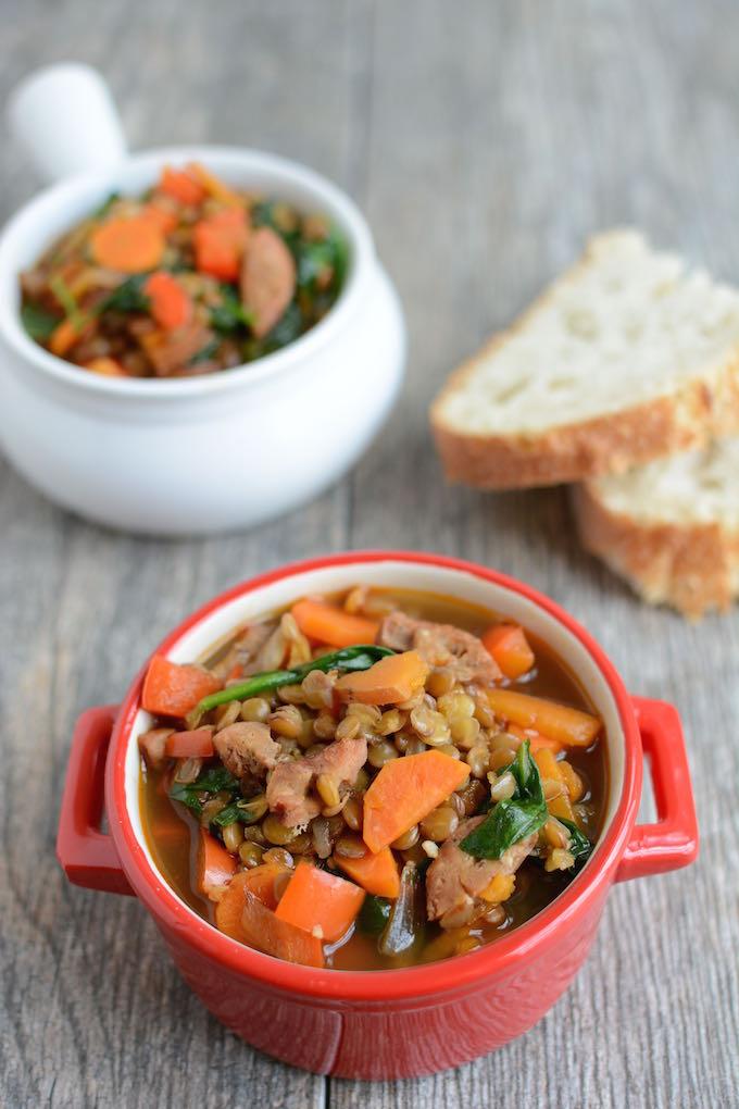 This Spicy Sausage Lentil and Kale Soup is protein-packed and full of vegetables. Make a batch to enjoy for dinner or pack it for lunch all week!