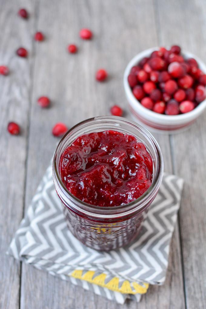 This Fresh Cranberry Sauce is simple to make, ready in 15 minutes and tastes great on everything from turkey to oatmeal! Make a batch and enjoy on your favorite breakfast, lunch, dinner and holiday recipes!