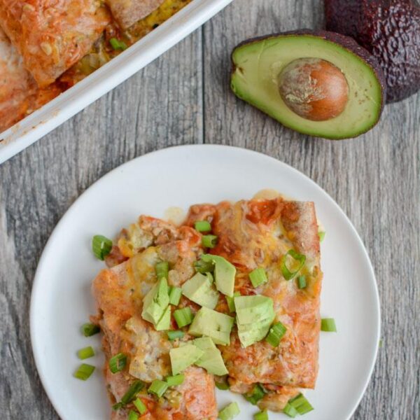 This Breakfast Enchilada Casserole is the perfect brunch dish for when you have company. Prep it the night before and pop it in the oven in the morning.
