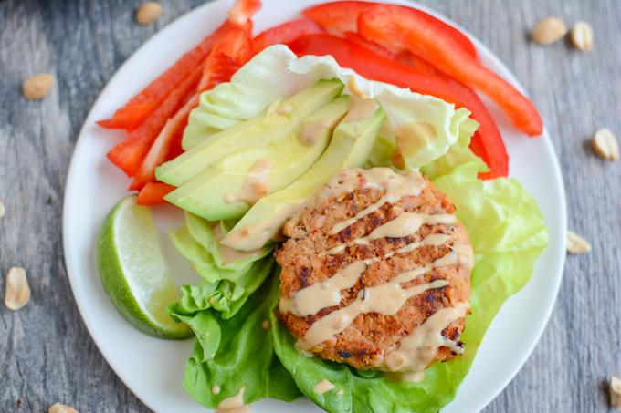 Thai Peanut Salmon Burger in lettuce wrap with avocado