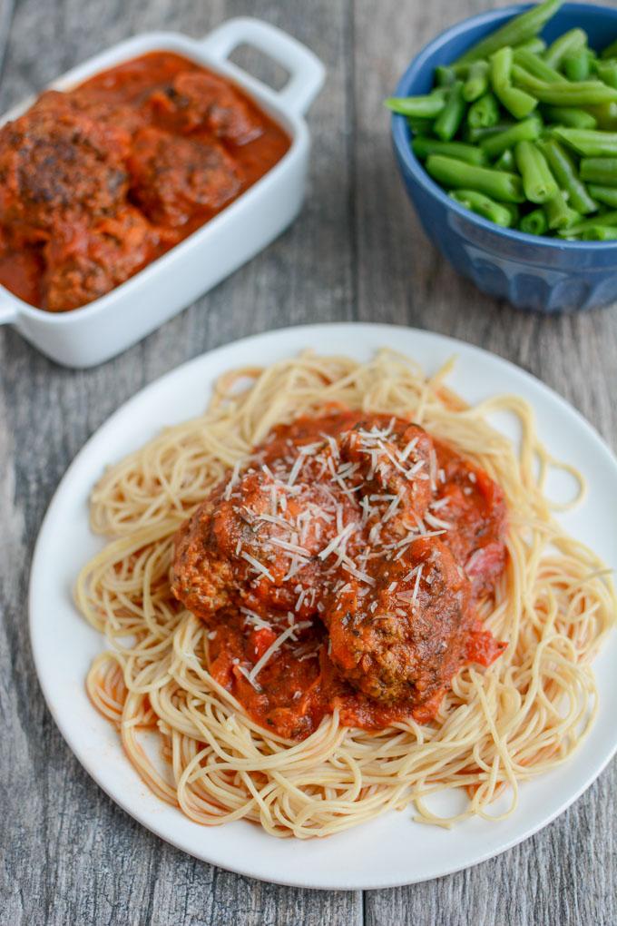 These Crockpot meatballs can be made in the slow cooker or Instant Pot for an easy, healthy dinner. Serve them over noodles, on a sub bun or enjoy them plain!