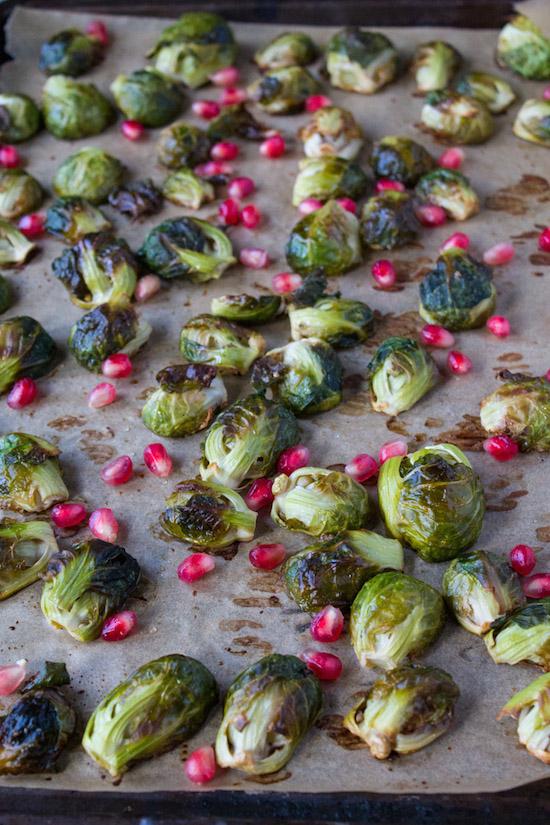 Brussels Sprouts with Pomegranate Seeds make beautiful holiday side dish. Bright red pomegranate seeds make these delicious, crispy caramelized Brussels sprouts pop with festive flair. 