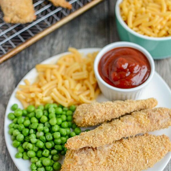 Freezer Chicken Tenders with steamed peas and mac and cheese for dinner