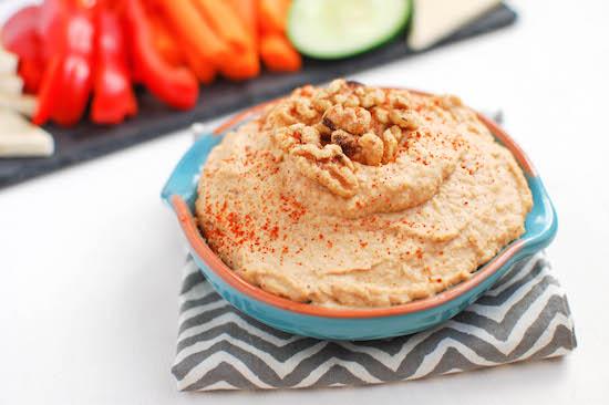 This Spicy Roasted Garlic Walnut Hummus is heart-healthy and full of flavor. Makes the perfect appetizer or snack!