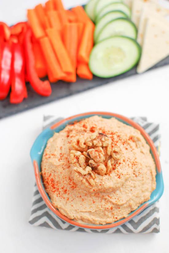 This Spicy Roasted Garlic Walnut Hummus is heart-healthy and full of flavor! Makes a great appetizer or snack!