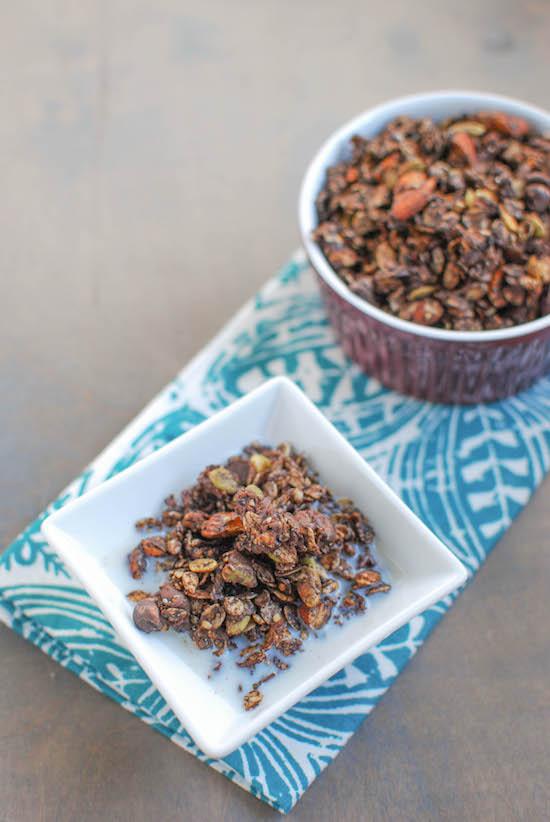 This Double Chocolate Granola is packed with nuts and seeds, tossed with coconut oil and lightly sweetened with honey. 