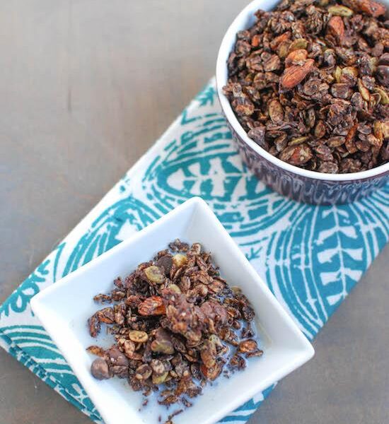 This Double Chocolate Granola is packed with nuts and seeds, tossed with coconut oil and lightly sweetened with honey.