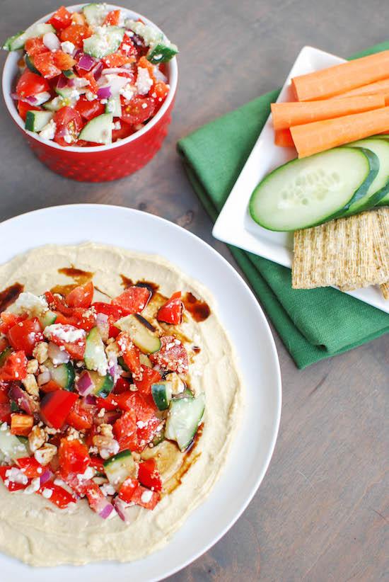 Hummus, veggies and feta in every bite makes this Greek Hummus Plate the perfect party appetizer or afternoon snack.