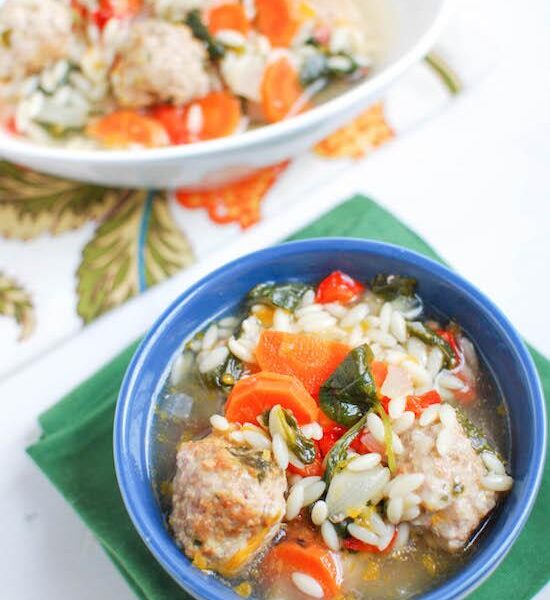 Packed with vegetables and mini meatballs, this Italian Wedding Soup is hearty, filling and sure to warm you up on even the coldest day!