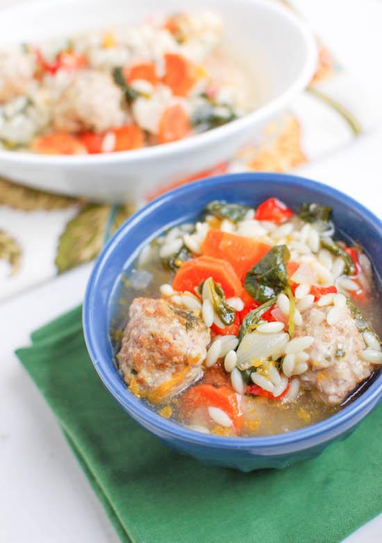 Packed with vegetables and mini meatballs, this Italian Wedding Soup is hearty, filling and sure to warm you up on even the coldest day!