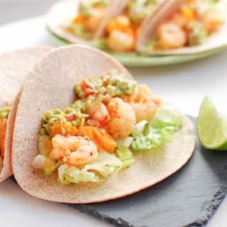 Slightly sweet and full of spice, these Spicy Shrimp Tacos are ready in 15 minutes, making them the perfect weeknight dinner!