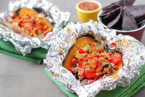 Let the crockpot do all the work with these Slow Cooker Loaded Sweet Potatoes. Individual foil packets make them easy to serve and cleanup is a breeze!