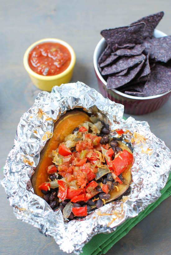 Let the crockpot do all the work with these Slow Cooker Loaded Sweet Potatoes. Individual foil packets make them easy to serve and cleanup is a breeze!