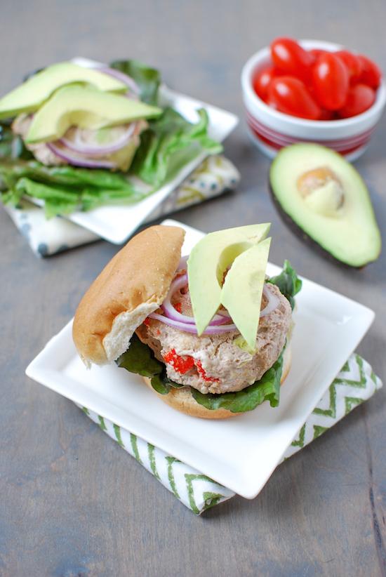 These California Turkey Burgers are packed with delicious flavors thanks to avocado, roasted red peppers and bacon. Perfect for grilling season!