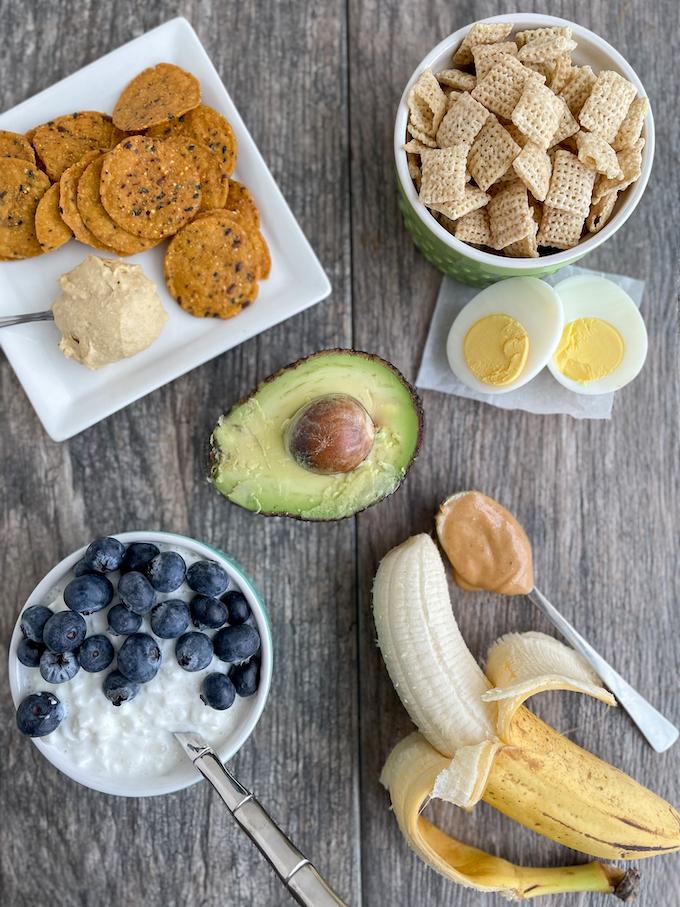 Healthy Toddler Snacks - cottage cheese, hummus, cereal, peanut butter with banana