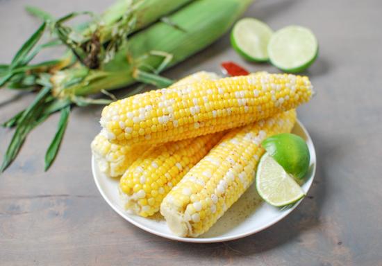 This Chili Lime Corn is the perfect balance of sweet and spicy. A fun way to jazz up your corn on the cob!
