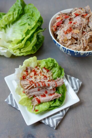 This Slow Cooker Asian Pulled Pork in lettuce wraps with rice for a quick dinner!