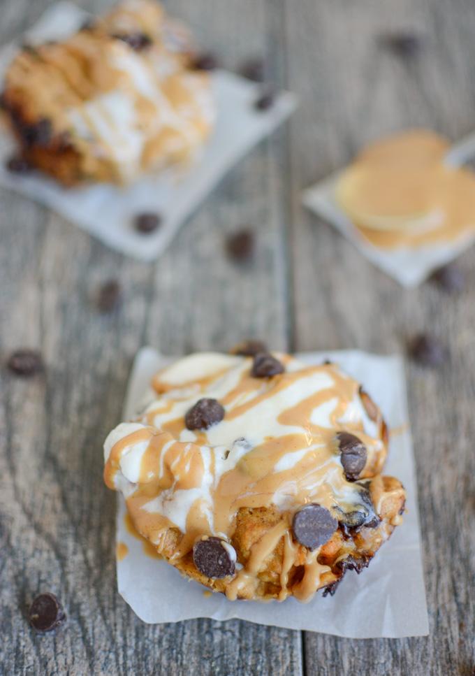 microwave sweet potato mug cake topped with melted ice cream, peanut butter and chocolate chips