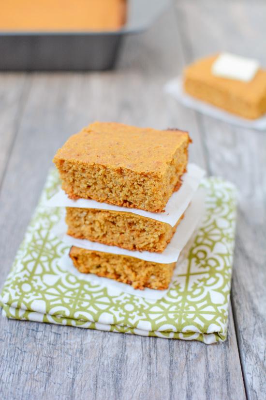 Lightly sweetened and full of fall flavors, this recipe for Pumpkin Cornbread is the perfect dinner side dish. Make a batch for Thanksgiving or enjoy with a big bowl of chili.