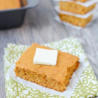 Lightly sweetened and full of fall flavors, this recipe for Pumpkin Cornbread is the perfect dinner side dish. Make a batch for Thanksgiving or enjoy with a big bowl of chili.