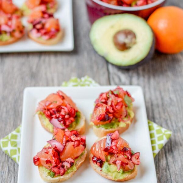 This Cranberry Clementine Salsa, paired with smashed avocado and a sliced baguette makes a simple, festive holiday appetizer!