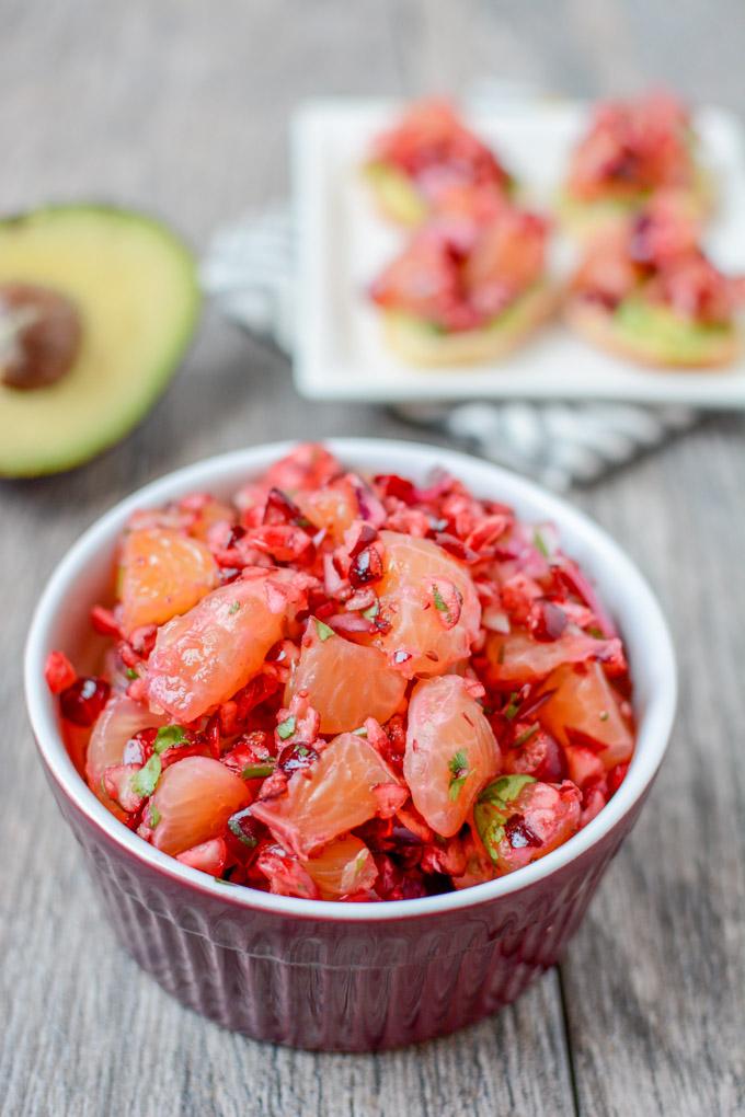 This Cranberry Clementine Salsa, paired with smashed avocado and a sliced baguette makes a simple, festive holiday appetizer!