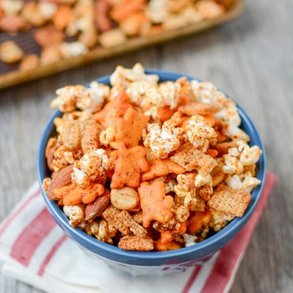 The perfect balance of spicy and sweet, this Popcorn Snack Mix is healthier than traditional Chex mix and highly addictive. Make a batch for your game day party or an afternoon snack.
