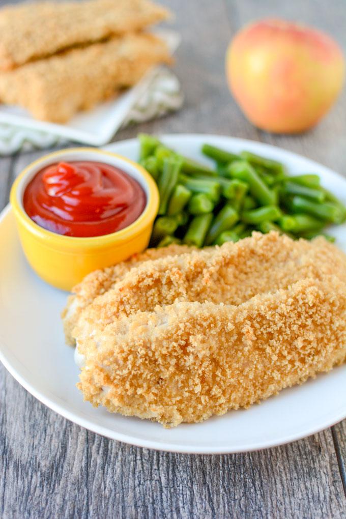 Let these Ranch Chicken Tenders sit in a homemade ranch marinade overnight, then simply roll in breadcrumbs and bake for a quick weeknight dinner!