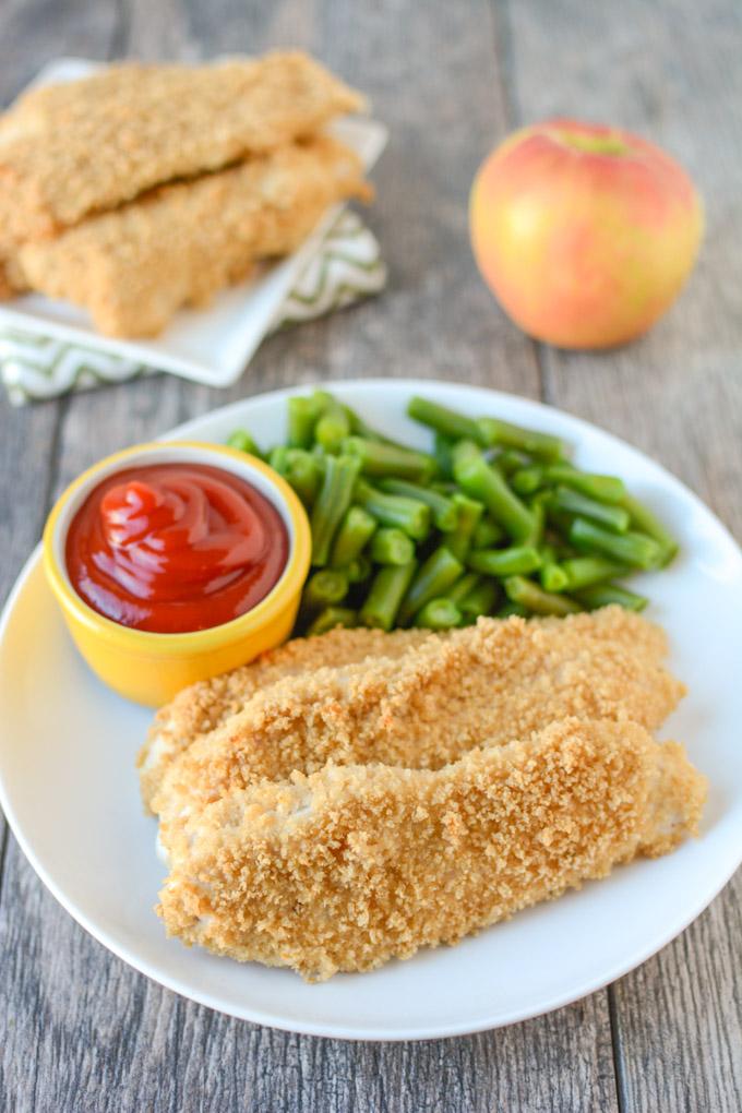 Let these Ranch Chicken Tenders sit in a homemade ranch marinade overnight, then simply roll in breadcrumbs and bake for a quick weeknight dinner!