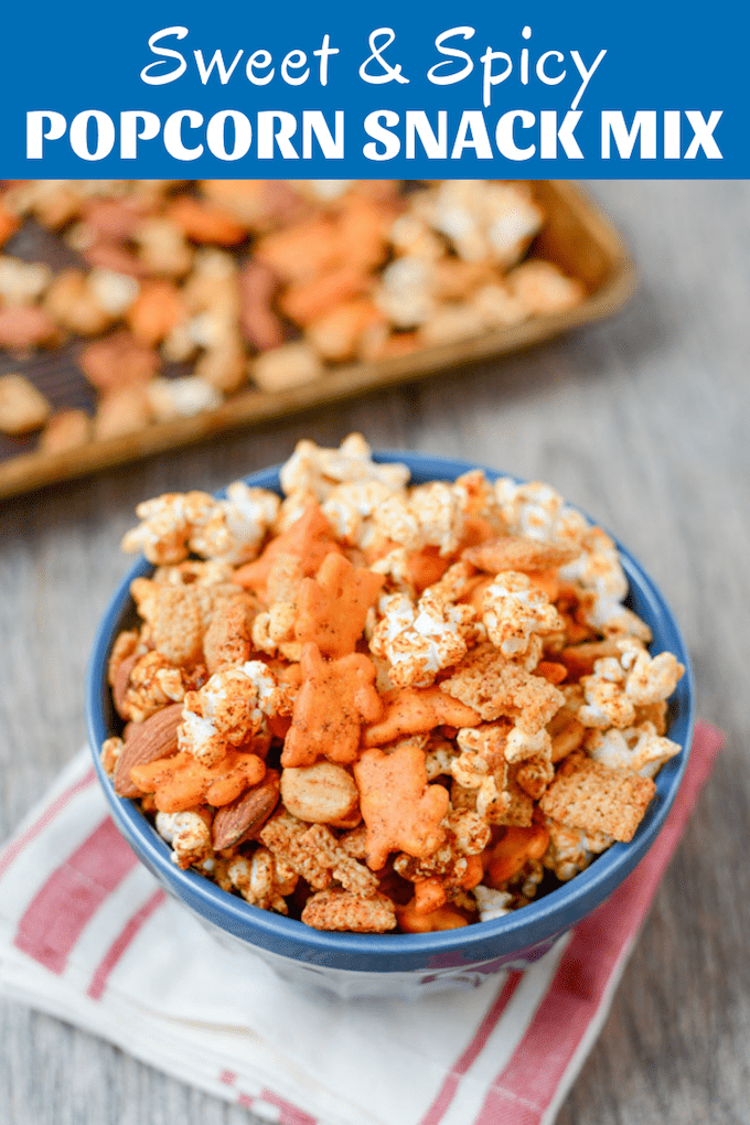 This Popcorn Snack Mix is the perfect balance of spicy and sweet, healthier than traditional Chex mix and highly addictive. Make a batch for your next party, game day or afternoon snack.