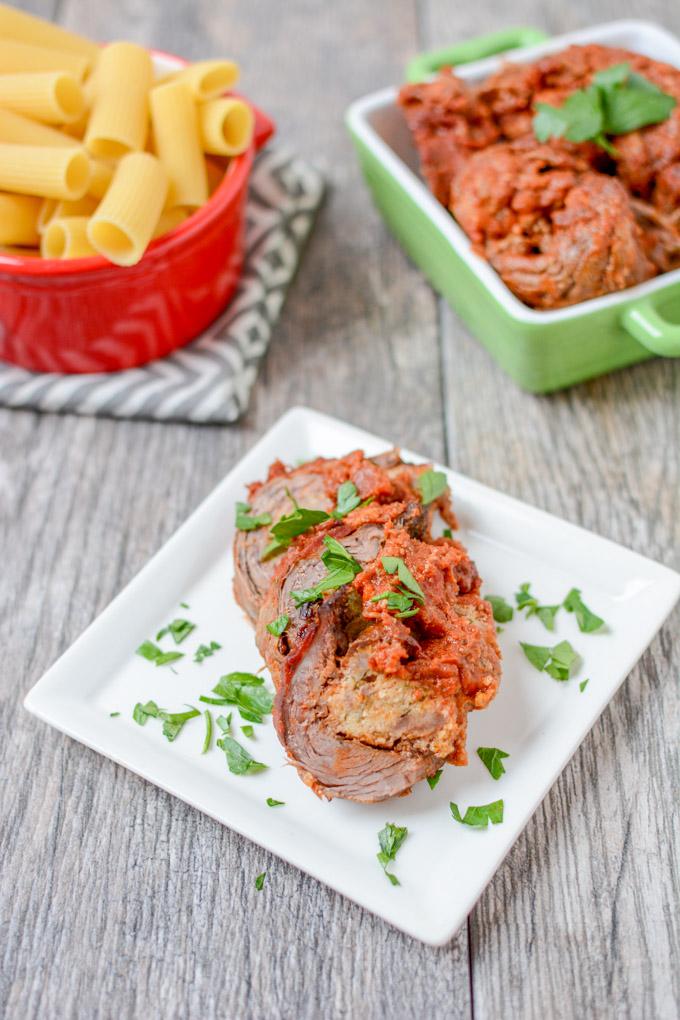 This recipe for Braciole is thinly sliced flank steak stuffed with sausage and simmered in tomato sauce until tender. Eat it solo or pair with pasta for a more traditional Italian dinner. 