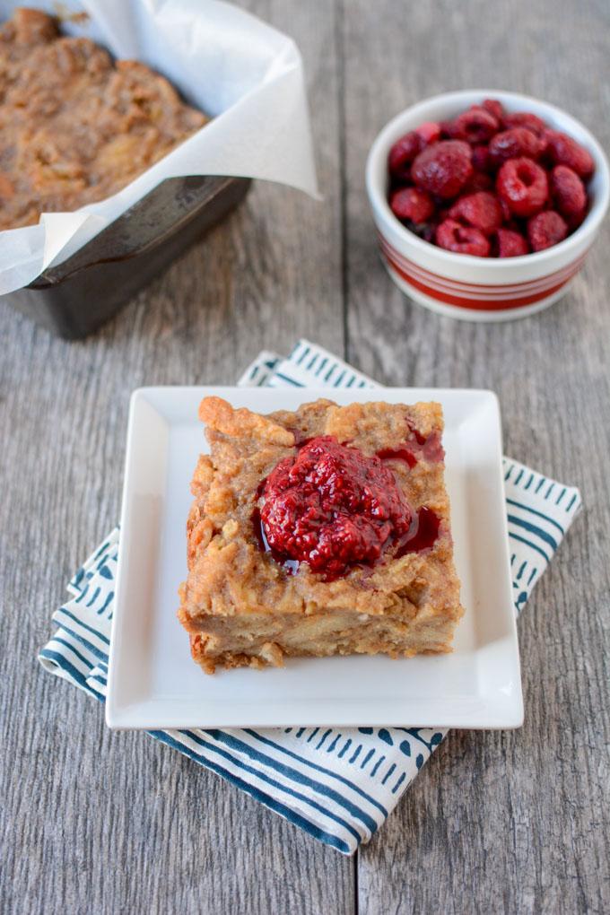 This recipe for a small batch of Peanut Butter Bread Pudding is perfect for dessert! Top with smashed raspberries for added sweetness.