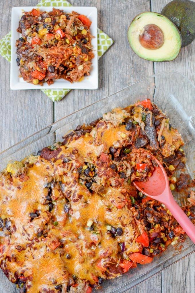 This recipe for Salsa Verde Pork Enchilada Casserole is gluten-free and easily makes two dinners. Serve the slow cooker salsa verde pork with rice one night and turn the leftovers into enchilada casserole later in the week. 