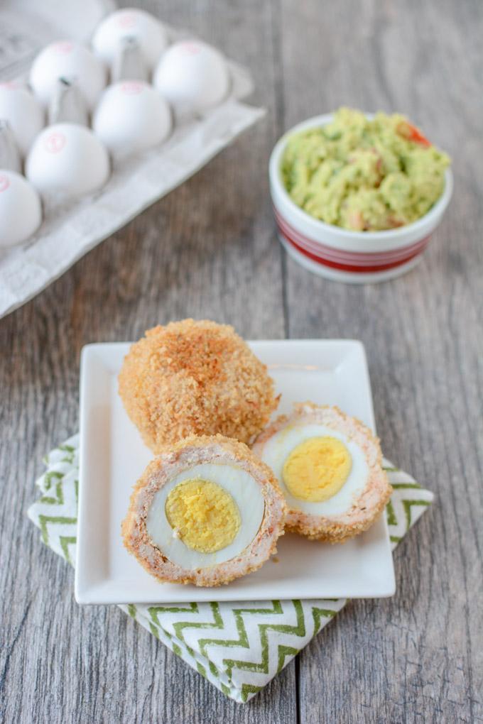 This recipe for Baked Scotch Eggs makes a great high protein breakfast. Enjoy them warm or cold and serve with guacamole for some added healthy fats! 