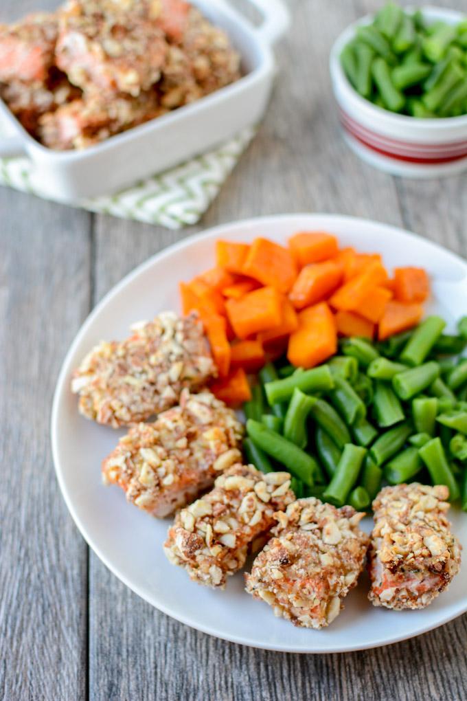 These Hemp and Almond Crusted Salmon Nuggets are a great recipe for getting your family to eat more fish. Made with just six ingredients, they're simple enough for a quick dinner and they're kid-friendly too!