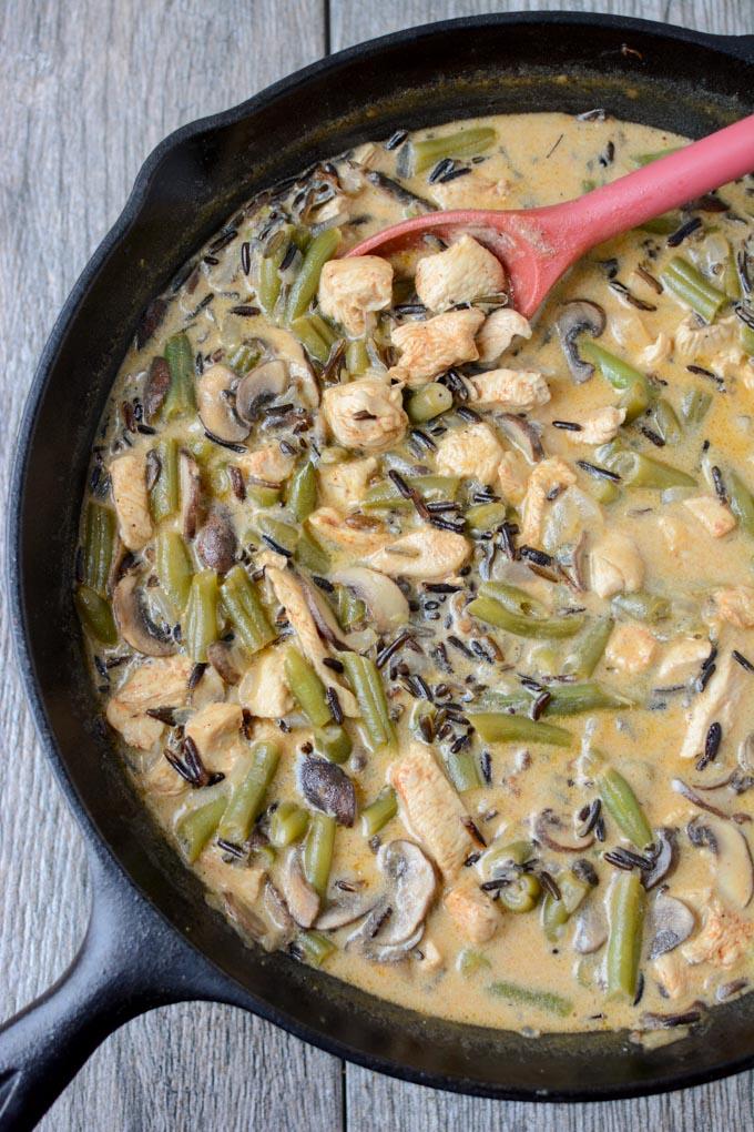 This gluten-free Creamy Chicken and Wild Rice Skillet recipe is the perfect dinner for a busy night. It's quick, healthy and packed with protein and vegetables.