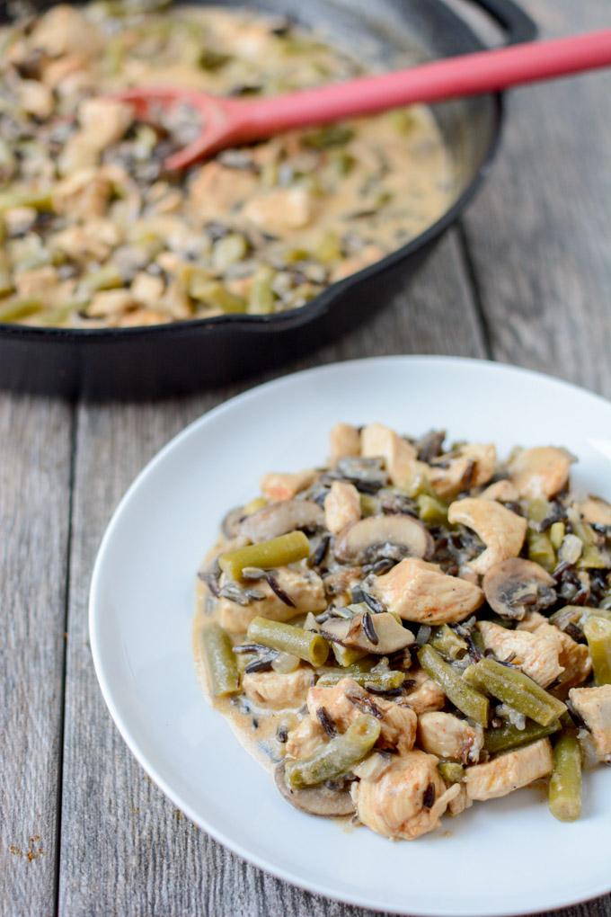 This gluten-free Creamy Chicken and Wild Rice Skillet recipe is the perfect dinner for a busy night. It's quick, healthy and packed with protein and vegetables. 