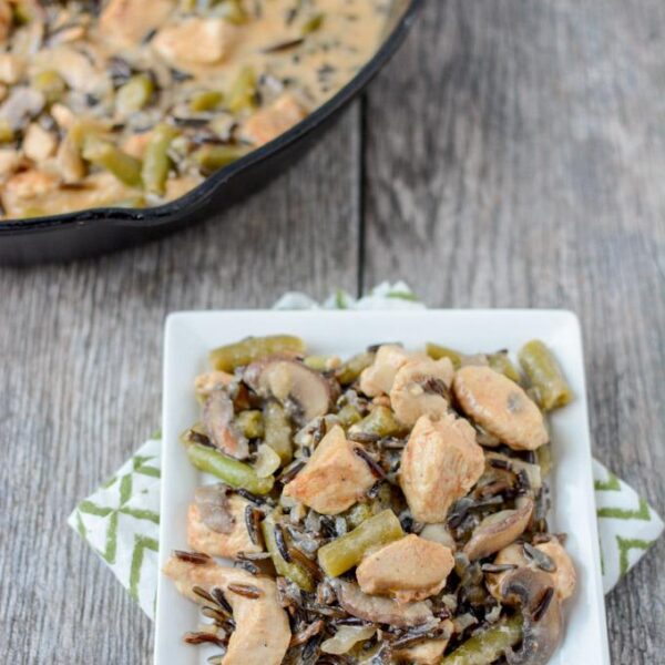 This Creamy Chicken and Wild Rice Skillet recipe is the perfect dinner for a busy night. It's quick, healthy and packed with protein and vegetables.