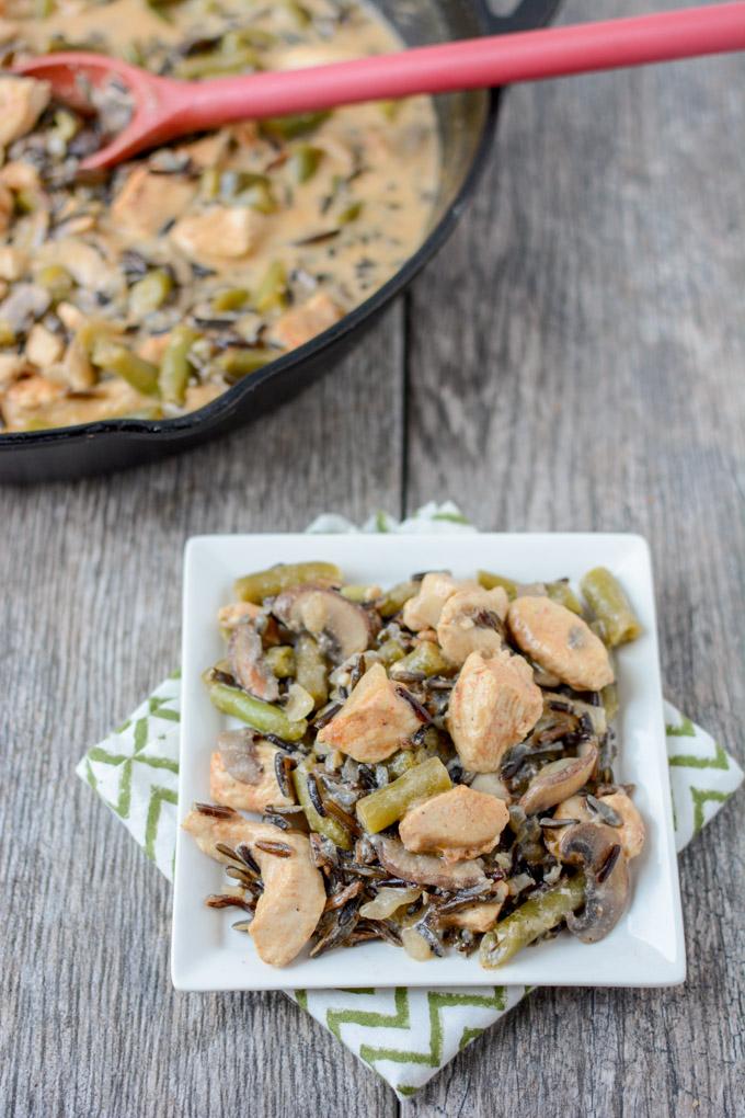 This gluten-free Creamy Chicken and Wild Rice Skillet recipe is the perfect dinner for a busy night. It's quick, healthy and packed with protein and vegetables. 