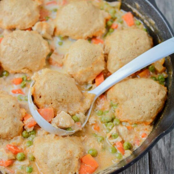 This recipe for Skillet Chicken and Dumplings makes an easy weeknight dinner. Ready in 30 minutes, it's healthy comfort food packed with protein and vegetables!