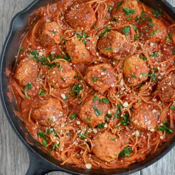 You only need one pan to make this recipe for Skillet Spaghetti and Meatballs because the spaghetti cooks right in the sauce! Your weeknight dinner just got even easier!