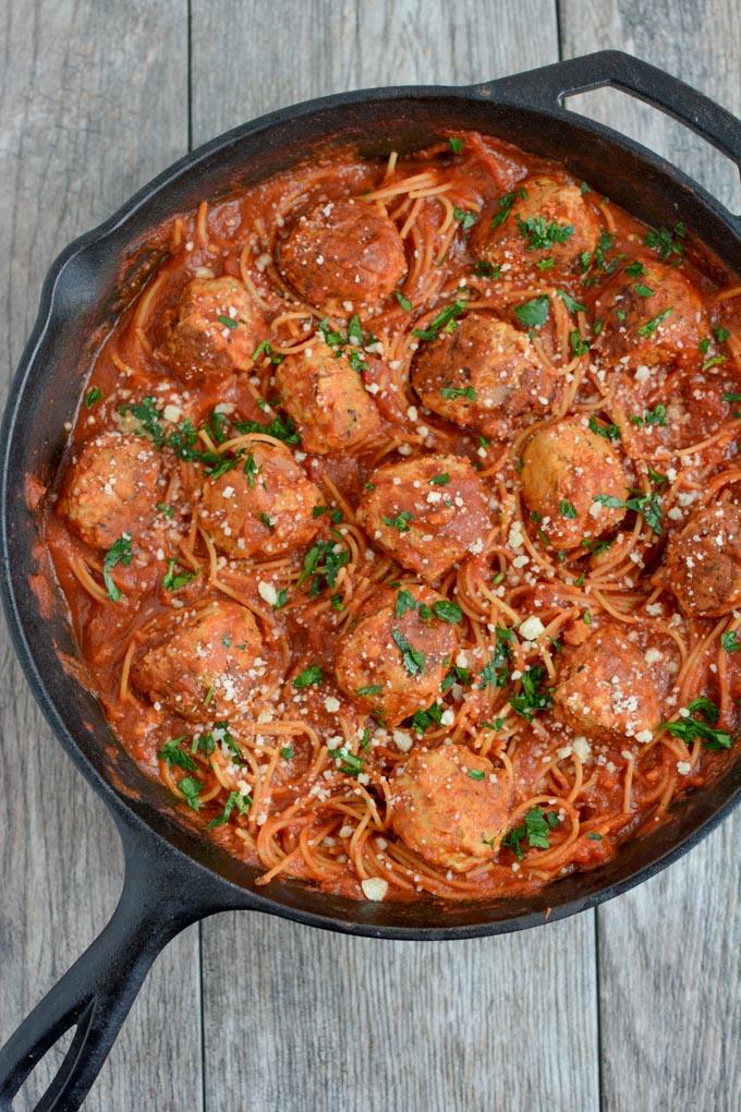 You only need one pan to make this recipe for Skillet Spaghetti and Meatballs because the spaghetti cooks right in the sauce! Your weeknight dinner just got even easier!