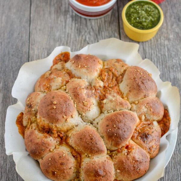 This recipe for Pesto Chicken Pizza Rolls is a fun way to change things up from traditional pizza. Serve them warm or cold, for lunch or dinner. They're easy to make and kid-friendly as well!